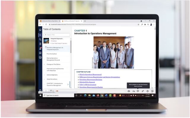 Laptop screen showing a VitalSource eTextbook bookshelf, from the Two-Minute Video